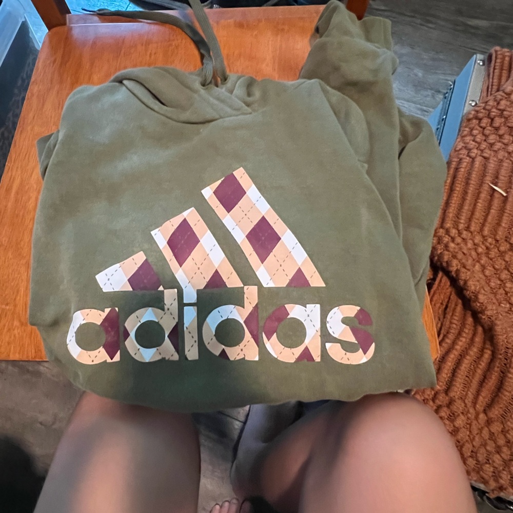 Adidas hoodie Olive color size small slight bleach stain on hood